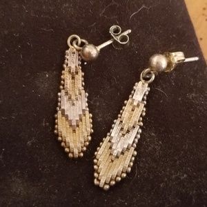 Gold and Silver Vintage style dangling earrings.